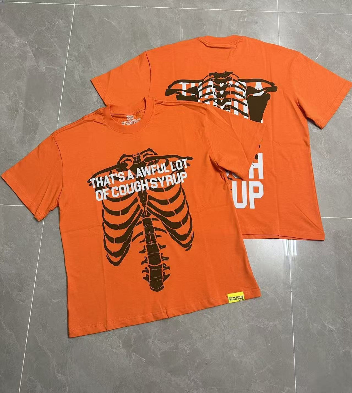 THAT'S A AWFUL LOT OF COUGH SYRUP Ribcage Graphic T-Shirt — front