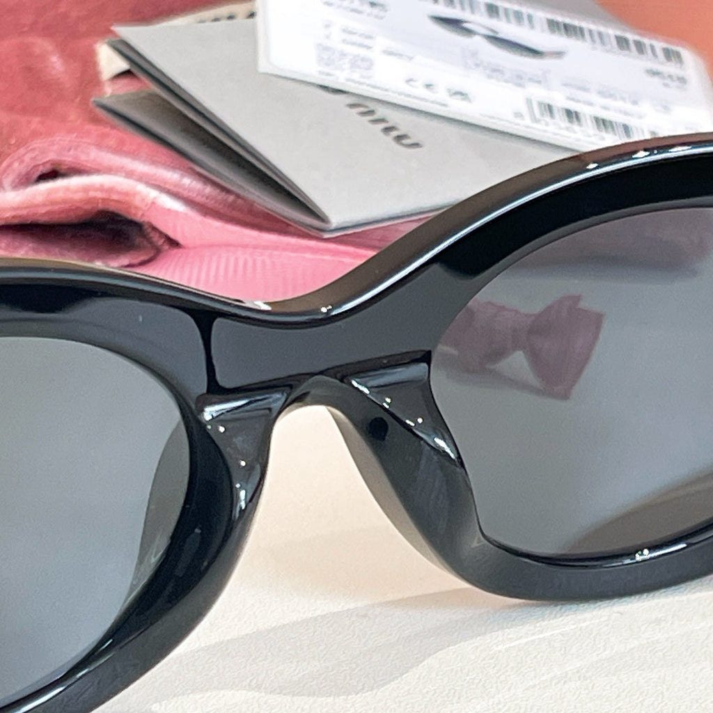 Miu Miu SMU 11W Sunglasses